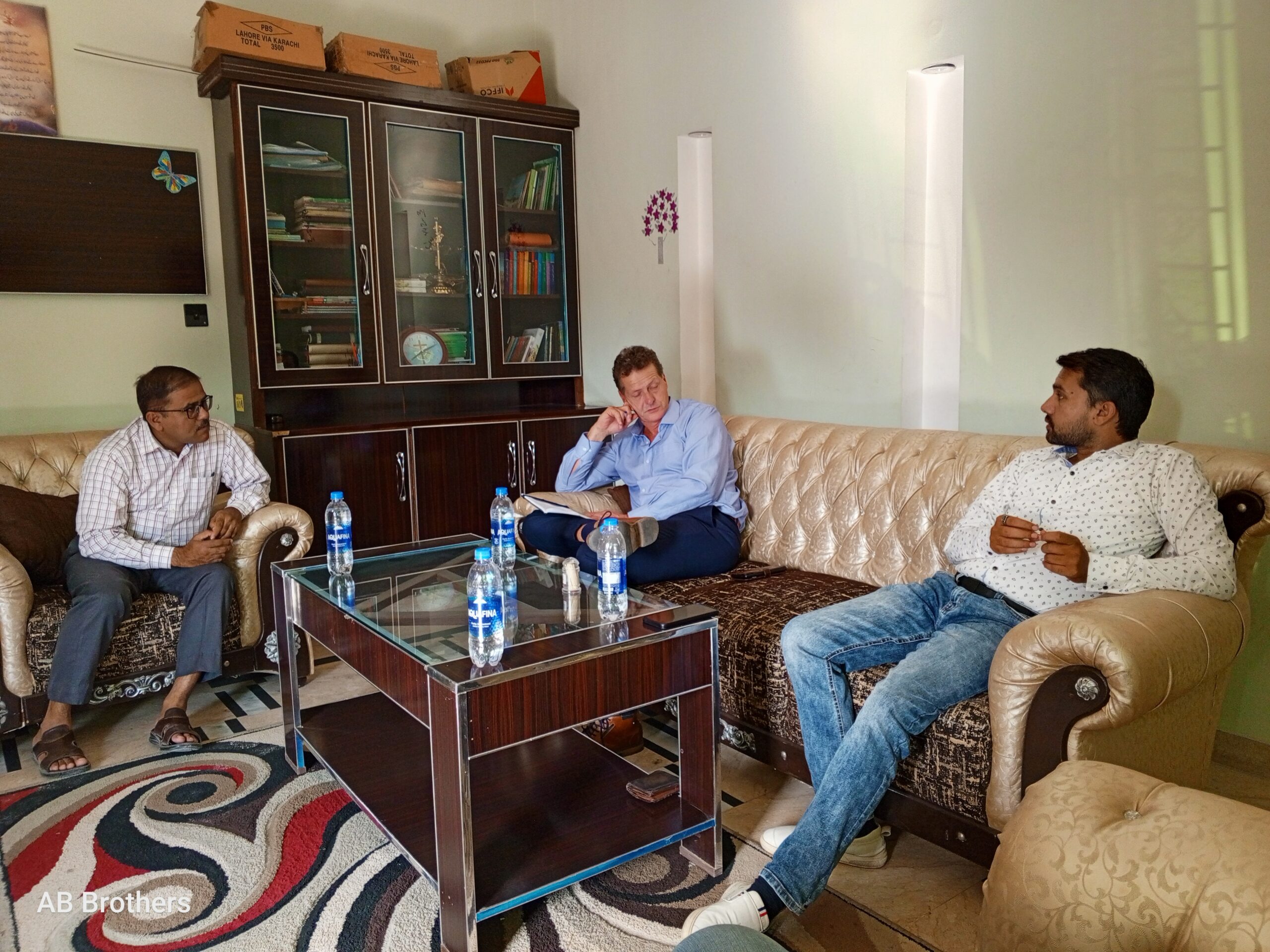 Woerden Enterprise partners in discussion at the Lahore office